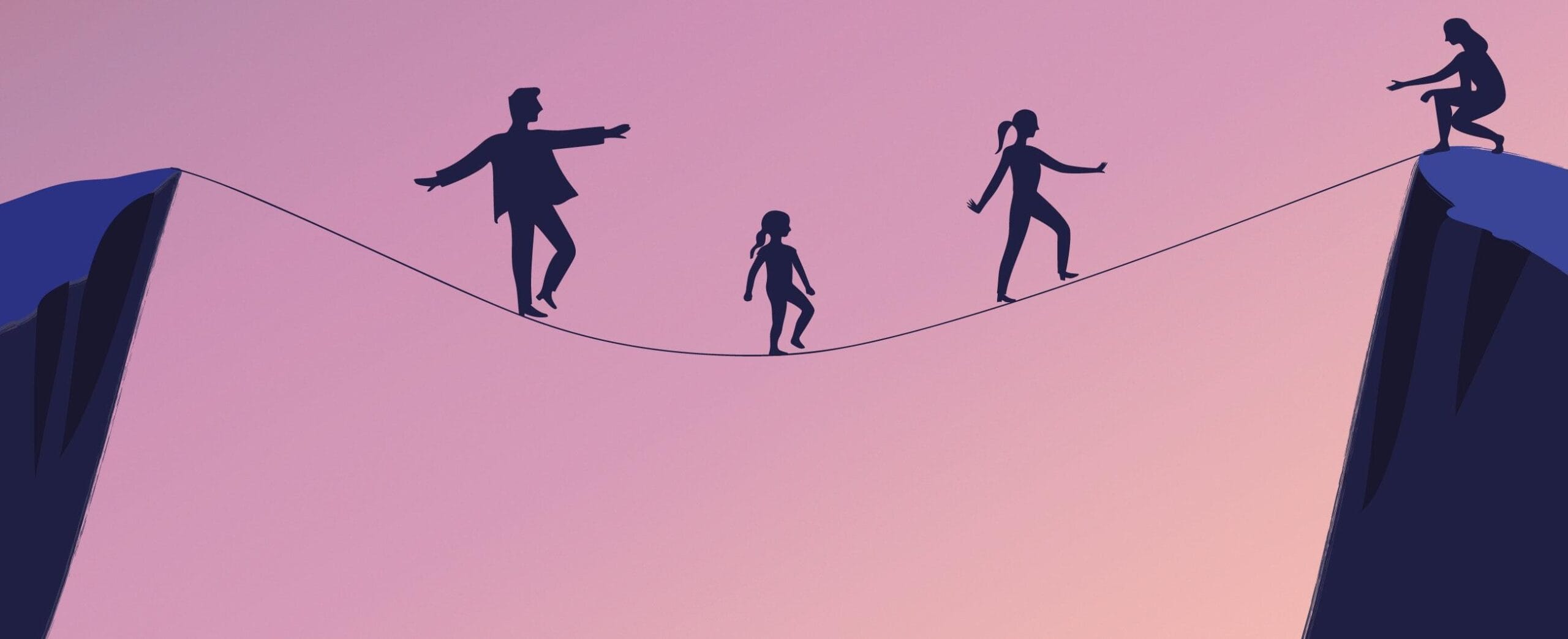 Lapsiperhe tasapainoilee ohuella köydellä. Yksi ihminen on vastaanottamassa.