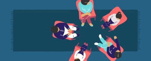 jossa lapsia ja aikuisia istumalla tuoleissa ringissä.kaksi puhelinta