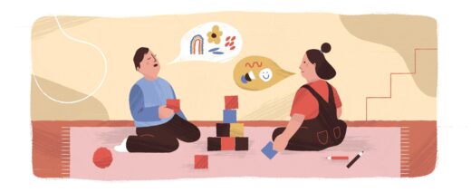 Piirroskuvassa lapset leikkivät palikoilla ja puhuvat kuvien avulla.