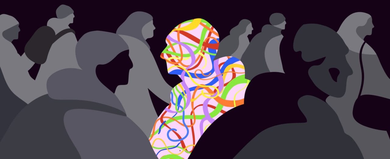 Ihminen värikäs keskellä harmaita hahmoja, piirroskuva.