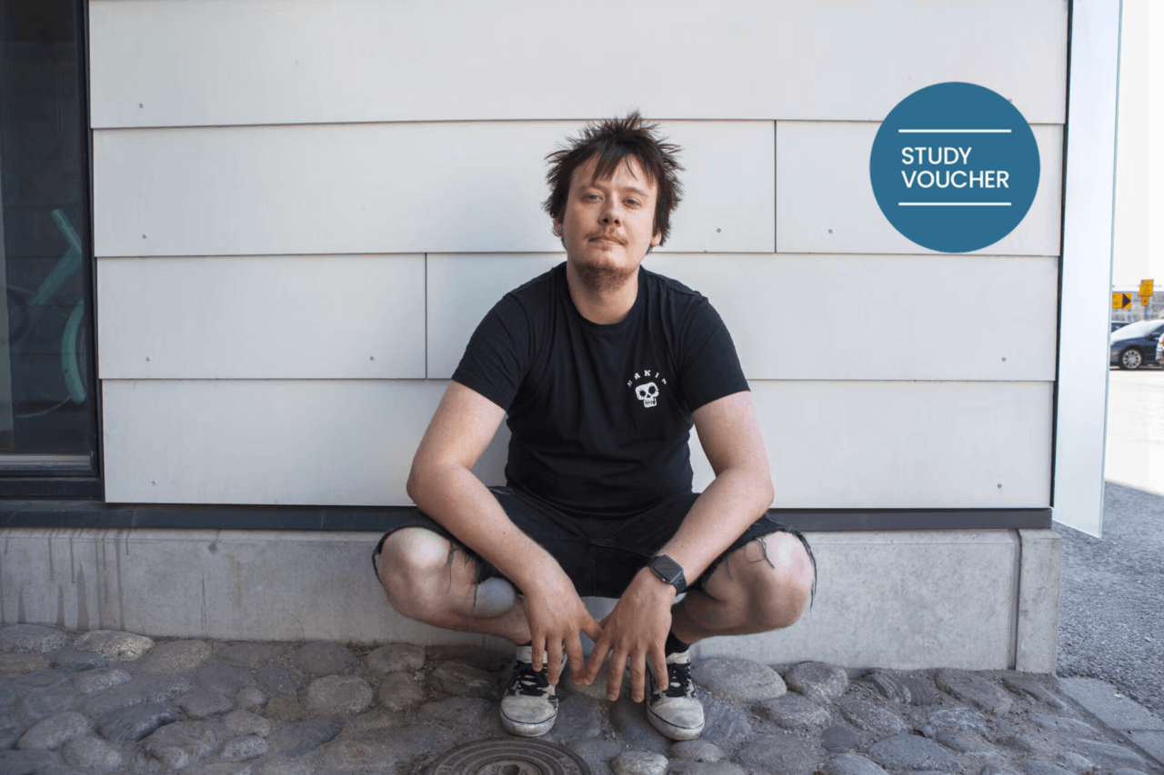 anYoung man in a squatting position.